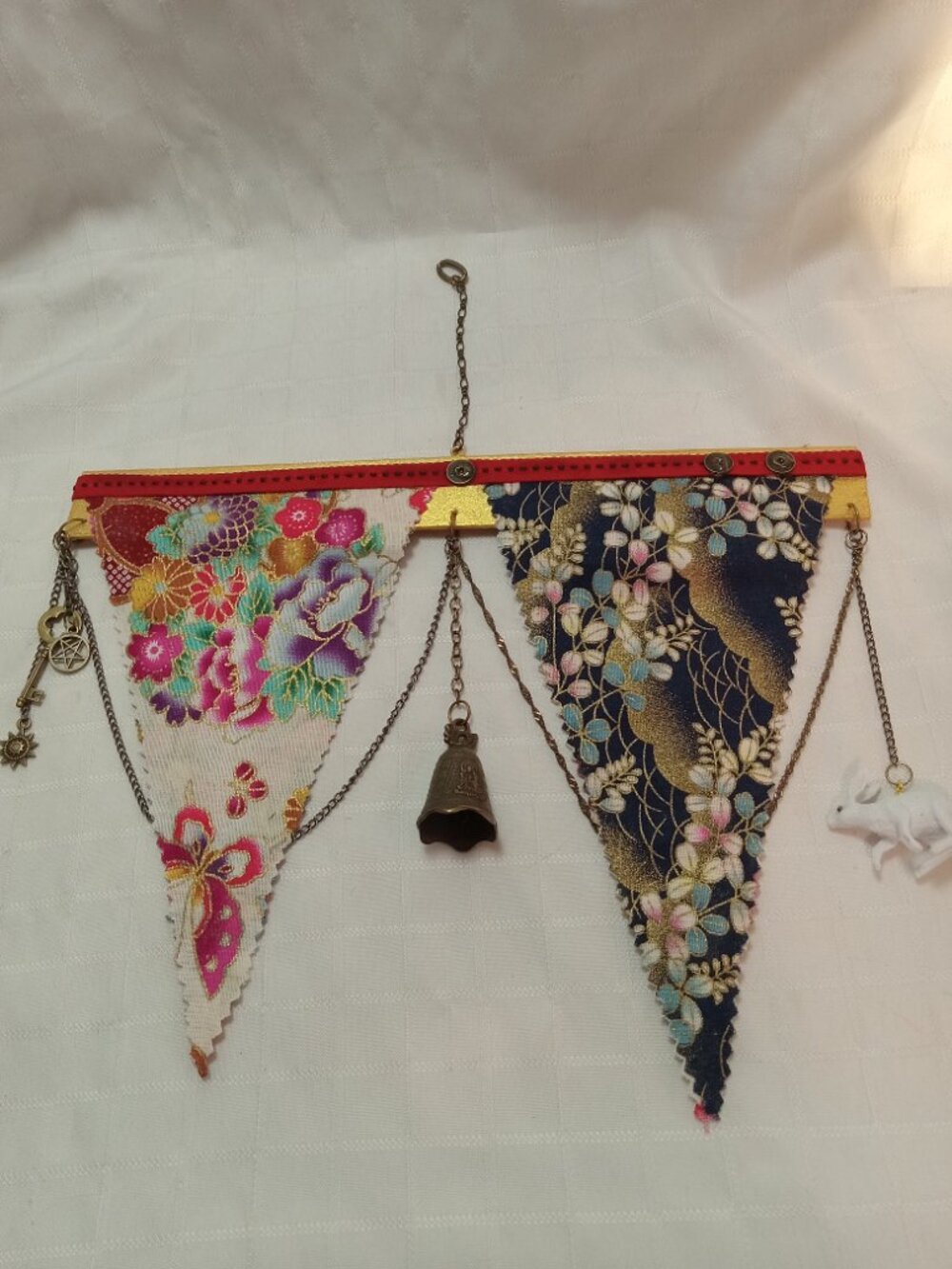 5-A reversible, handmade hanging banner made with fabric, chains, charms & coins